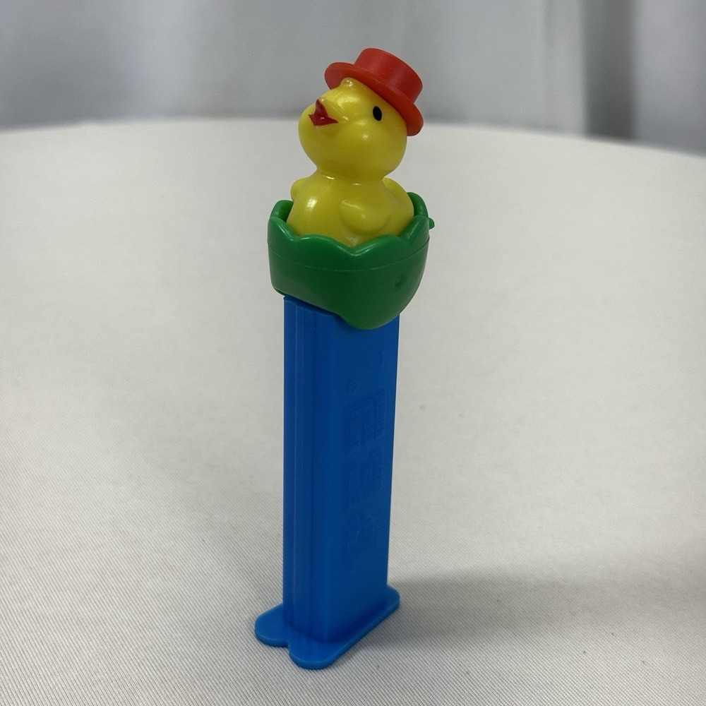 Pez Despenser Chick In Green Egg W/ Red Hat Footed Blue Vintage - Picture 1 of 6